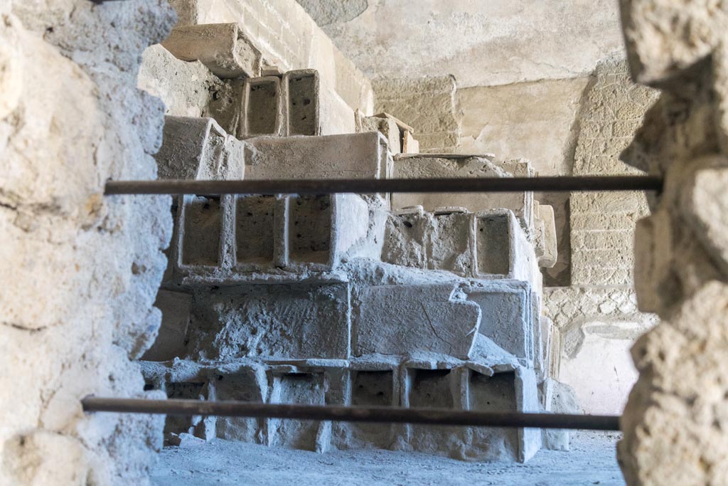 Herculaneum Suburban Baths. October 2023.
Terracotta tubes stacked in the Baths, and still awaiting installation as heating flues, completely filled with the dense ash from the pyroclastic flows.
Photo courtesy of Johannes Eber.